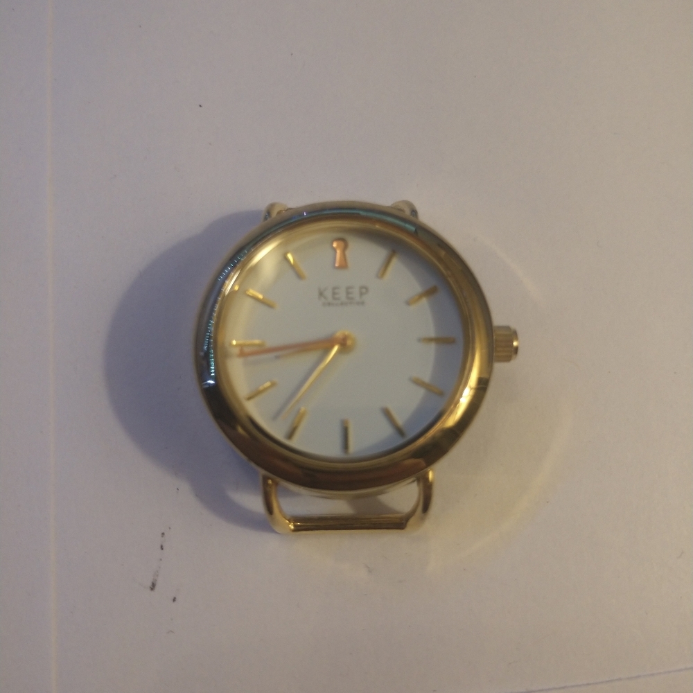 Keep collective gold round watch face